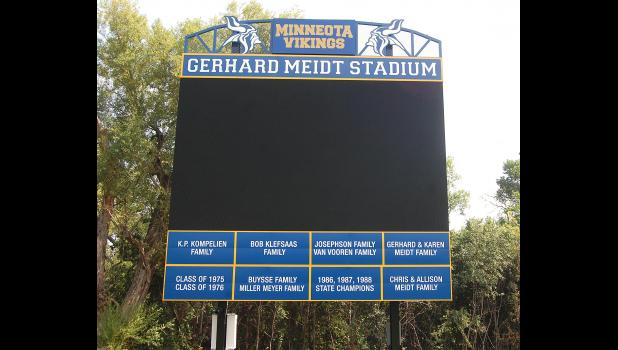 The new scoreboard was recently installed at Gerhard Meidt Stadium (K.P. Kompelien Field) and the list of “Angel” donors who helped make it a a reality. Mascot photo by Scott Thoma