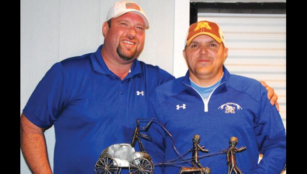 Contributed photo. Shove the Bug winners were Jeff Jerzak, left, and Patrick Jerzak of Team Jerzak Farms.