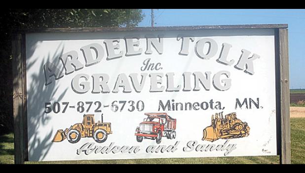 Staff photo by Scott Thoma. Sign outside the Tolk Graveling headquarters.