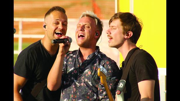 Staff Photo by Byron Higgin A group called, "The Color" brought their message, in song, to the crowd in the grandstand at the Lyon County Fair on Wednesday.