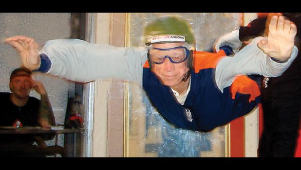 Special File Photo. Virgil’s son Bill, a sky diving expert, talked his dad into taking this dive in an enclosed area.