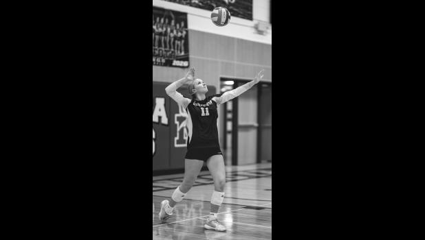 Libby Sussner of Minneota gets set to send a serve to Canby last Tuesday in Minneota.