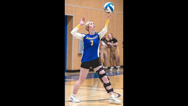 Madison senior Madison Minnehan serves to start the match against Canby last Tuesday. 