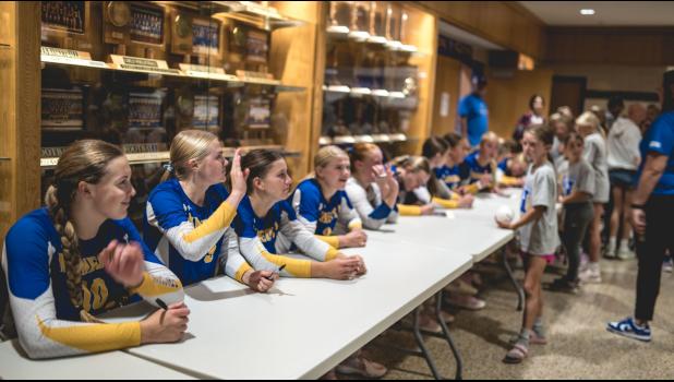 Members of the Minneota volleyball team held a “Meet and Greet” and signed autgraphs for fans following their match last Tuesday against Dawson-Boyd. The Vikings swept Dawson-Boyd and have now won 10 straight matches. 
