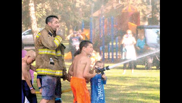 Special photo. One of the favorites for the kids were the waterfights and the lawn mowers were also a large part of the event.