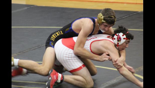 Contributed photo Chase Johnson, left, of Minneota wrestles Luverne's Leif Ingebretsen at 145 pounds in the Red Rock Quadrangular last Tuesday. Johnson pinned Ingebretsen in 1:56.