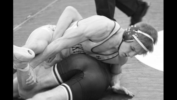 Mascot photo by Mindy Fier Destin Fier (top) of Minneota won by decision over Max Martin of Hutchinson last Thursday at the NYA Triangular.