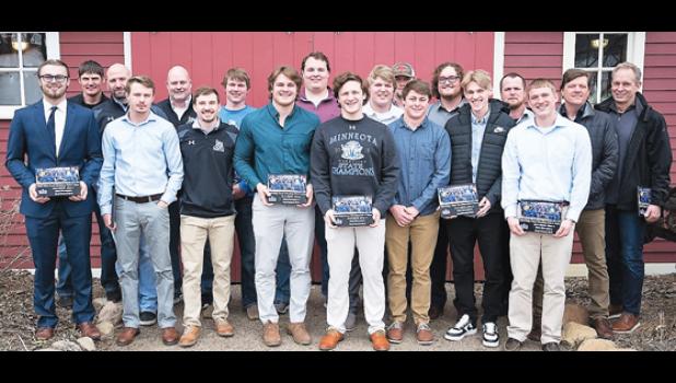 Mascot photo by Brian Jeremiason The 2015 Class A state championship athletes and coaches. Front row, left to right: Bryce Bruner, Avery VanOverbeke, Brock Buysse, Cole Hennen, Nick Esping, Brendan Reiss, Henry Pesch, Kyle Hennen. Back row, left to right: Kris Fier, Drew Bouwman, Matt Myrvik, Austin DeVlaeminck, Jordan Tweet, Everett Van Hecke, Nathan Bueltel, Trent Esping, Alec Bueltel, J.D. Pesch, Joel Skillings.