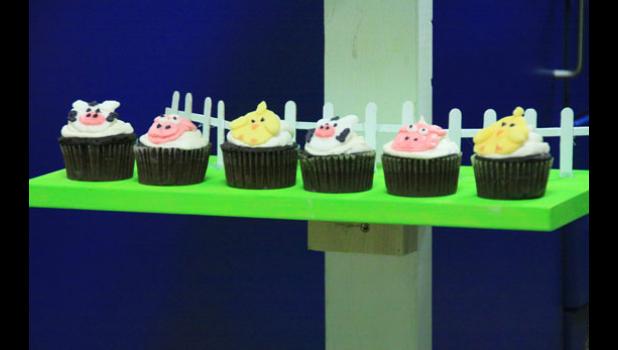 Staff Photo by Byron Higgin. Barnyard cupcakes