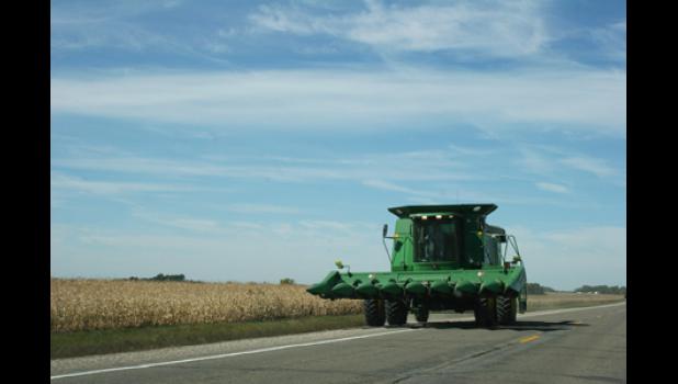 Special photo. Motorists need to be prepared to encounter slow-moving farm vehicles, especially on rural, two-lane roads.