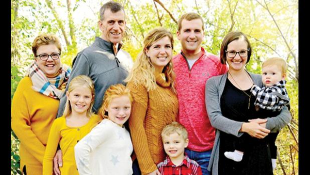 Special photo. The Hoffman family includes: (front row, left to right) granddaughters Piper and Autum and grandson Elliott. Back: Lee Anne, Bruce, Jessica (daughter) Adam (son) Emily (daughter-in-law) holding grandson Zander.