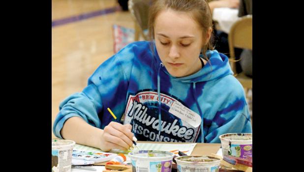 Photo for the Mascot by Sue Jacobson. Isabel Bruner was painting Dakota horses.