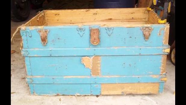 Special photo. A before shot of one of Markell's restored trunks.