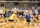 Abby Hennen is counted on to get the ball to the hitters in the front line. Here she met the ball with Lizzy Gillingham (4) down her knees to help. Lydia Sussner and Morgan Kockelman waited for the ball to arrive. 