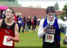Staff Photo by Byron Higgin They came to the finish line and Canby-Minneota's Alexander Full reached deep and passed Sam Fox of Redwood Valley.