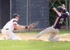 Mudhen third baseman Austin Buysse tagged out Searles Jack Fairbairn on a double play in the second inning.