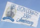  A closeup of the 80-foot commemorative banner as it flies over the Marshall Airport on Saturday. 