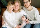 Meg and Bill Longhenry, along with their son, Theo, and daughter, Millie.