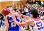 Nolan Boerboom pulled up for a shot at the basket against Canby's Joey Hiedemann.