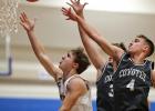 Easton Johnson, left, drops in two of his 17 points against Heron Lake-Okabena/Fulda Friday night. 