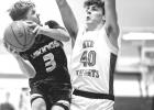 Evan Jerzak looks to score inside against Russell-Tyler-Ruthton's Colten Thomsen last Tuesday in Minneota. 