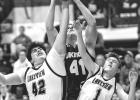 Kyson Arndt (41) of Minneota grabs a rebound away from a pair of Lakeview players last week in Minneota. Arndt had his first varsity double-double with 11 points and 16 rebounds in the Vikings' 58-39 win. 