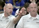 Coach Chad Johnston points to action on the floor as Assistant Coach Dale Kockleman looked on.