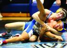 Cole VanOverbeke pinned Angel Martinez of Adrian.