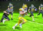 Photo for the Mascot by Brian Jeremiason Cole Sanow breaks a 78-yard touchdown.