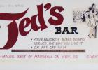 This handmade cardboard laminated sign belonged to the former Ted’s Bar in Ghent along Highway 68.
