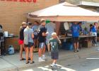 The Ribbon Wranglers 4-H group drew a big crowd of people who took time out from shopping to eat a burger lunch in front of Brad’s Market.