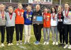 The Section 3A runner-up Canby/Minneota girls’ cross-country team. Left to right: Claire Stoks, Taylor Ourada, Lillie Wollum, Ava Danielson, Mya Pesek, Coach Allyson Pesek, Jonna Briggs, Natalie Stoks, Adri Christianson, Maleah Schubert, Nohemi Diaz. 