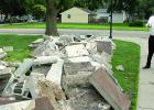Supt. Dan Deitte showed piles of concrete outside the elementary building during a school board tour of the work in progress at the school.