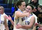 Lydia Sussner embraced Morgan Hennen after the third place win. Sussner and Abby Hennen were named to the All-Tournament Team. Sussner was named All-State before the start of the Tournament. Morgan Kockelman (left) and Natalee Rolbiecki looked on.