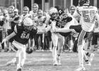 Minneota's Kyson Arndt blocks Wesley Verhelst's punt in the second quarter and the Vikings recovered at the Canby four yard-line.