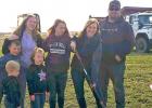 Jamie Gillund, second from right, breaks ground on the new Little Explorers Child Care Center, LLC that will soon be constructed in Ghent. The Gillund family pictured left to right, Gunner, 4; Kestler, 8; Daylin, 15; Whitney 6, Skyla, 14; Jamie and Kurt.  