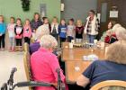 Girl Scout Troop 37814 singing Christmas songs at the Minneota Manor. 