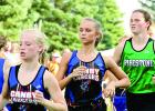 File Photo by Byron Higgin Canby-Minneota runners in a pack include McKenzie Ruether (left) and Kameron King.