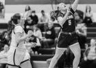 Autum Anderson of the Vikings drives to the basket to score against Dawson-Boyd. 