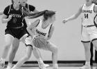 Nevaeh Hennen of Minneota secures a loose ball against Lakeview last Thursday night in Cottonwood. Hennen came off the bench and scored 13 points for the Vikings.