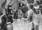 Sarah Gruenes (1) of Minneota fires off a jump shot against YME last Thursday in Minneota. Gruenes finished with 14 points and 11 rebounds. 