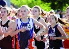 Grace Drietz was in the middle of the back, but she broke away and finished third in the 800-meter prelims at the state meet.