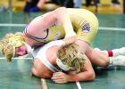 Photo for the Mascot by Laura Buysse. Jonah Gruenes wrestling his way to a championship at 145 pounds for the only Minneota title at Litchfield.