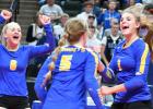 Abby Rost (left) and Abby Hennen (right) celebrated with Ireland Stassen