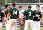 Minneota Mudhens celebrated a home run by Adam Durfee (right)