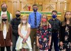 These students participated in the First Communion at Hope Lutheran Church in Minneota on Sunday, Oct. 4. Front row, left to right: Madison Minnehan, Brooklyn Ryer, Gretta Buysse, Addison Buysse. Back row, left to right: Pastor Lance Isaacson, Heydan Danielson, Landon Esping, Cole Johnson.