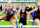 Kameron King (left) is the hurdle "King" for Canby-Minneota.