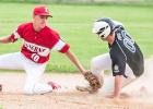 Isaac Pohlen (00) steals second base in the fourth inning against Luverne last Thursday in Minneota. 