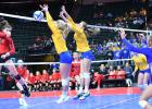 Lizzy Gillingham and Lydia Sussner went high to block a shot by Ada-Borup's Kora Kritzberger as Abby Hennen watched.