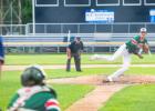 Winning pitcher Jake Hennen of the Mudhens delivers a pitch to a Madison batter.
